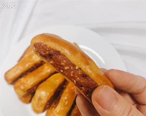 芝麻焦酥饼和鸡内金饼的制作方法（简单易学的美食佳品，了解制作过程，享受美味）