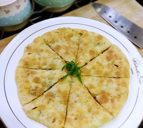 香气四溢的油煎饼（传统早餐美食的制作秘诀）