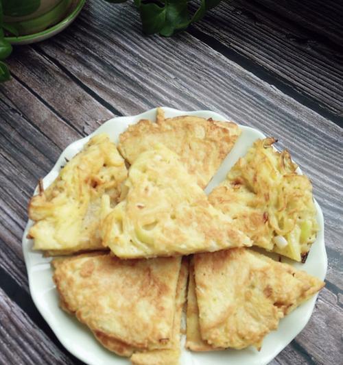 用土豆丝制作美味营养饼的做法（简单易学，健康美味，让你欲罢不能）