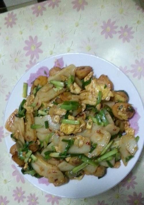 美味豌豆尖炒年糕（以豌豆尖为主料的年糕炒菜）